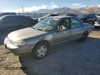 1998 Ford Contour z VIN 1FAFP66Z5WK232756, wystawiony jako Copart lot #86648364 z przebiegiem 118 176 mil mil oraz Tytuł czysty. Historia ofert i sprzedaży dostępna na DreamBid. Obrazek 1.