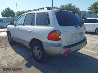 2004 Hyundai Santa Fe GLS with VIN KM8SC73D74U675555, listed as a IAAI auction lot 42021978 with 198,778 mi miles. Bid and sale history available at carsss.com. Image 3.