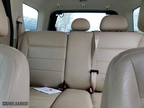 2008 Ford Escape XLT with VIN 1FMCU03128KD08434, listed as a Copart auction lot 51042975 with 123,629 mi miles and Salvage Title. Bid and sale history available at carsss.com. Image 10.