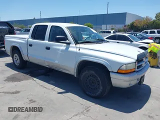 2003 Dodge Dakota SLT z VIN 1D7HL48N03S184534, wystawiony jako IAAI lot #42423520 z przebiegiem 197 070 mil mil oraz . Historia ofert i sprzedaży dostępna na DreamBid. Obrazek 1.