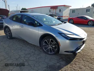 2024 Toyota Prius LE z VIN JTDACAAU0R3043106, wystawiony jako IAAI lot #41971599 z przebiegiem 19 016 mil mil oraz . Historia ofert i sprzedaży dostępna na DreamBid. Obrazek 1.