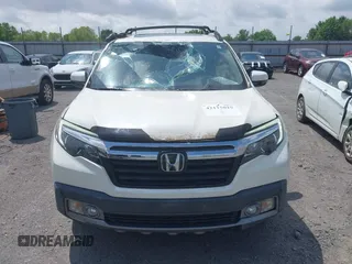 2019 Honda Ridgeline RTL-E with VIN 5FPYK3F77KB021667, listed as a IAAI auction lot 42115019 with 87,221 mi miles and . Bid and sale history available at DreamBid. Image 12.