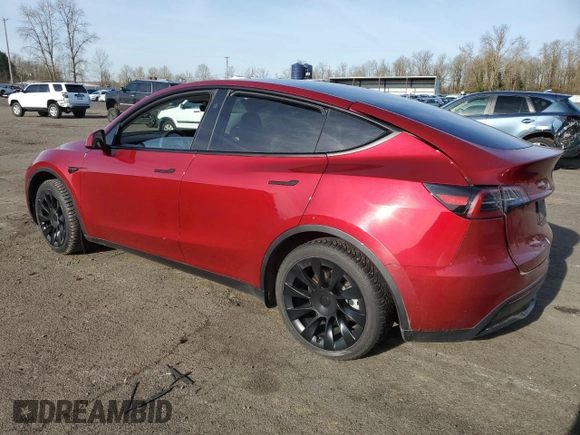 2024 Tesla Model Y Long Range with VIN 7SAYGAEEXRF056411, listed as a Copart auction lot 89218715 with Not Provided miles and Salvage Title. Bid and sale history available at DreamBid. Image 2.