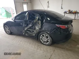 2016 Scion iA z VIN 3MYDLBZV3GY126714, wystawiony jako Copart lot #53955955 z przebiegiem 79 349 mil mil oraz Szkoda całkowita • Salvage title. Historia ofert i sprzedaży dostępna na DreamBid. Obrazek 2.