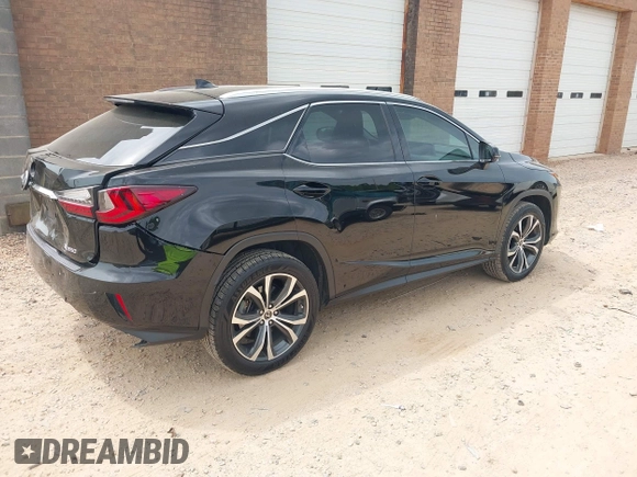 2019 Lexus RX with VIN 2T2ZZMCA6KC150398, listed as a IAAI auction lot 42080027 with 68,598 mi miles. Bid and sale history available at carsss.com. Image 4.