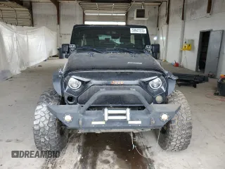 2012 Jeep Wrangler Unlimited Sahara with VIN 1C4BJWEG3CL195271, listed as a Copart auction lot 59947235 with 212,819 mi miles and Salvage title. Bid and sale history available at DreamBid. Image 5.