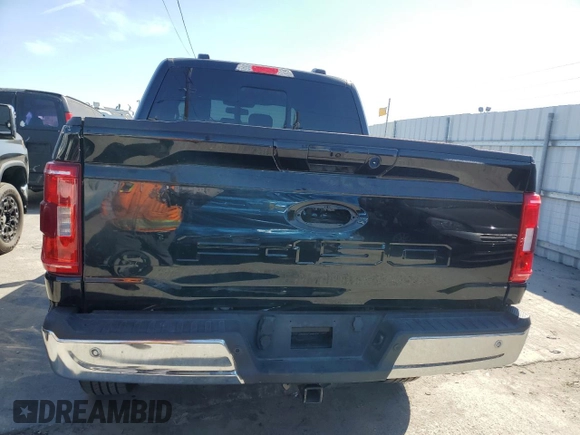 2021 Ford F-150 XL with VIN 1FTFW1E54MFD11453, listed as a Copart auction lot 50240015 with 8,645 mi miles and Salvage title. Bid and sale history available at DreamBid. Image 6.