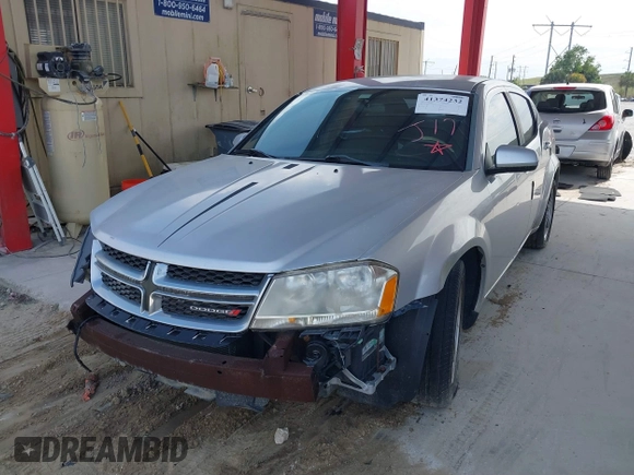 2012 Dodge Avenger SXT with VIN 1C3CDZCB2CN195212, listed as a IAAI auction lot 41374232 with 107,973 mi miles and . Bid and sale history available at DreamBid. Image 2.