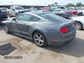 2022 Ford Mustang EcoBoost with VIN 1FA6P8TH2N5104155, listed as a IAAI auction lot 42068259 with 47,963 mi miles and . Bid and sale history available at DreamBid. Image 3.