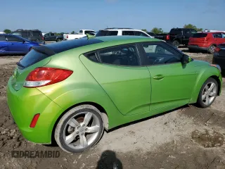 2012 Hyundai Veloster w/Gray Int z VIN KMHTC6AD1CU066882, wystawiony jako Copart lot #55781745 z przebiegiem 167 427 mil mil oraz Czysty tytuł • Clean title. Historia ofert i sprzedaży dostępna na DreamBid. Obrazek 3.
