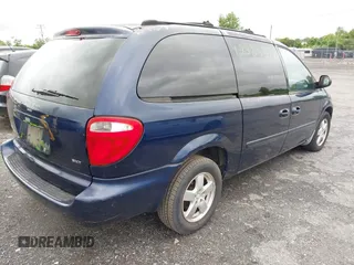 2005 Dodge Caravan SXT z VIN 2D4GP44L85R380517, wystawiony jako IAAI lot #42283827 z przebiegiem 172 404 mil mil oraz . Historia ofert i sprzedaży dostępna na DreamBid. Obrazek 4.