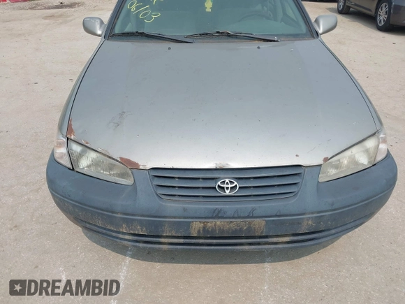 1998 Toyota Camry LE z VIN 4T1BG22K2WU278958, wystawiony jako IAAI lot #42422136 z przebiegiem 272 772 mil mil oraz . Historia ofert i sprzedaży dostępna na DreamBid. Obrazek 14.