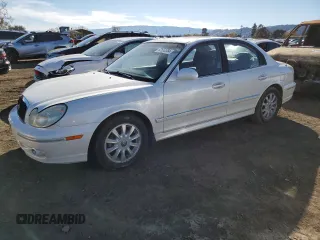 2004 Hyundai Sonata GLS with VIN KMHWF35HX4A975027, listed as a Copart auction lot 82652354 with 148,296 mi miles and Salvage Title. Bid and sale history available at carsss.com. Image 1.