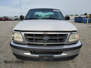 1998 Ford F-150 with VIN 1FTZX17W2WKB25677, listed as a Copart auction lot 54419145 with 319,584 mi miles and Salvage title. Bid and sale history available at DreamBid. Image 5.
