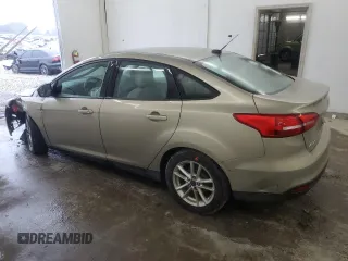 2016 Ford Focus SE with VIN 1FADP3F2XGL355148, listed as a Copart auction lot 73304284 with 166,785 mi miles and Salvage Title. Bid and sale history available at carsss.com. Image 2.