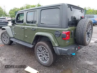 2023 Jeep Wrangler Sahara with VIN 1C4JJXP64PW684210, listed as a IAAI auction lot 42244388 with 23,622 mi miles and . Bid and sale history available at DreamBid. Image 3.