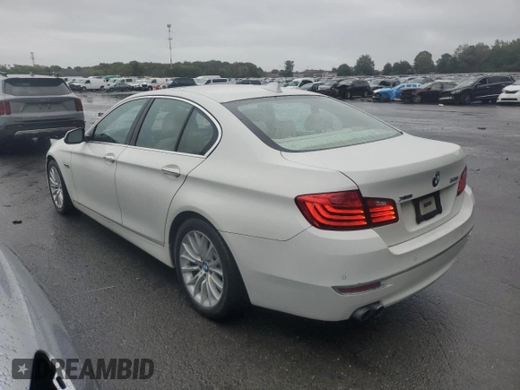 2014 BMW 5 Series 528i xDrive with VIN WBA5A7C52ED614418, listed as a Copart auction lot 68406324 with 139,548 mi miles and Salvage Title. Bid and sale history available at carsss.com. Image 2.