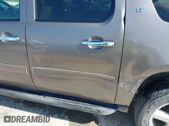 2011 Chevrolet Suburban LT with VIN 1GNSCJE03BR396610, listed as a IAAI auction lot 42348029 with 249,280 mi miles and . Bid and sale history available at DreamBid. Image 6.