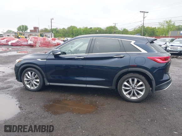 2020 Infiniti QX50 Luxe with VIN 3PCAJ5M3XLF107050, listed as a IAAI auction lot 42176146 with 54,347 mi miles and . Bid and sale history available at DreamBid. Image 14.