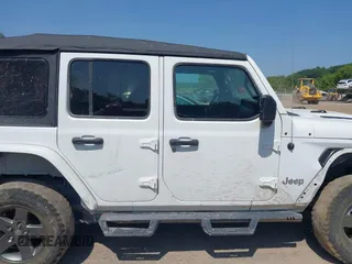 2018 Jeep Wrangler Unlimited Sport S with VIN 1C4HJXDGXJW146873, listed as a IAAI auction lot 42404813 with 73,929 mi miles and . Bid and sale history available at DreamBid. Image 14.