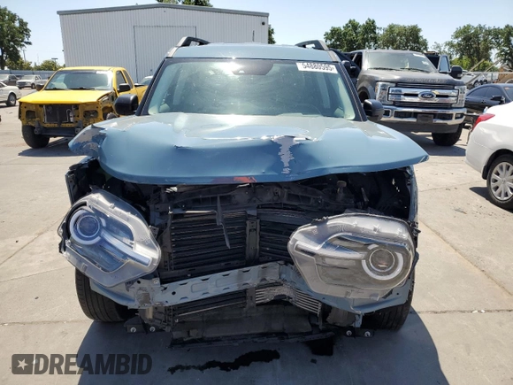 2023 Ford Bronco Sport Big Bend with VIN 3FMCR9B69PRD42089, listed as a Copart auction lot 54880595 with 34,984 mi miles and Salvage title. Bid and sale history available at DreamBid. Image 5.