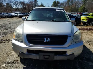 2005 Honda Pilot EX-L z VIN 5FNYF18595B055806, wystawiony jako Copart lot #52372625 z przebiegiem 180 886 mil mil oraz Czysty tytuł • Clean title. Historia ofert i sprzedaży dostępna na DreamBid. Obrazek 5.