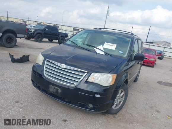 2010 Chrysler Town & Country Touring with VIN 2A4RR5D13AR155611, listed as a IAAI auction lot 42094894 with 132,966 mi miles. Bid and sale history available at carsss.com. Image 2.