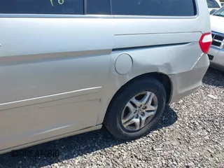 2005 Honda Odyssey EX-L with VIN 5FNRL38695B425315, listed as a IAAI auction lot 42175154 with Not provided miles and . Bid and sale history available at DreamBid. Image 6.