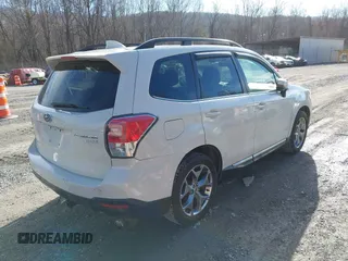 2017 Subaru Forester Touring with VIN JF2SJAWC0HH550052, listed as a IAAI auction lot 41475102 with 115,600 mi miles and . Bid and sale history available at DreamBid. Image 4.
