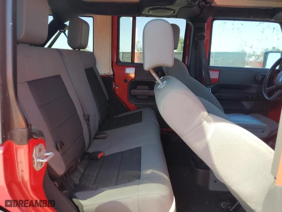 2010 Jeep Wrangler Unlimited Sport with VIN 1J4BA3H10AL171104, listed as a Copart auction lot 53656125 with 192,898 mi miles and Clean Title. Bid and sale history available at carsss.com. Image 11.