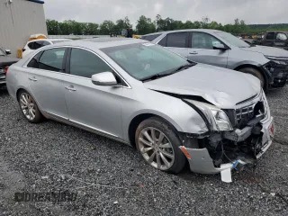 2014 Cadillac XTS Luxury z VIN 2G61M5S30E9187222, wystawiony jako Copart lot #54511125 z przebiegiem Nie podano mil oraz Szkody całkowita. Historia ofert i sprzedaży dostępna na DreamBid. Obrazek 4.