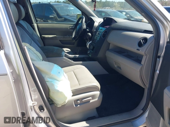 2011 Honda Pilot Touring with VIN 5FNYF4H91BB086712, listed as a IAAI auction lot 41809369 with 260,718 mi miles. Bid and sale history available at carsss.com. Image 5.