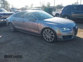 2012 Audi A7 3.0 Prestige with VIN WAUSGAFCXCN001849, listed as a IAAI auction lot 41712682 with 102,833 mi miles. Bid and sale history available at carsss.com. Image 1.