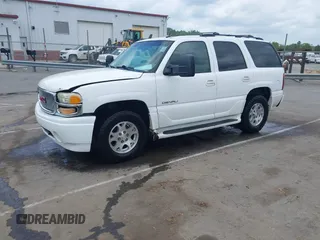 2005 GMC Yukon Denali z VIN 1GKEK63U55J259803, wystawiony jako IAAI lot #42126835 z przebiegiem 199 762 mil mil oraz . Historia ofert i sprzedaży dostępna na DreamBid. Obrazek 2.