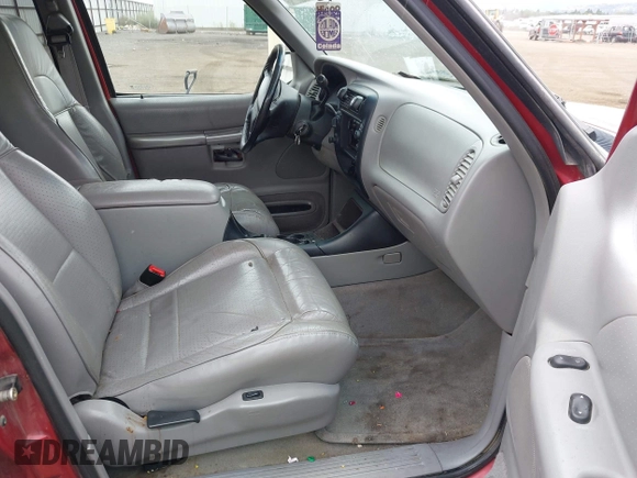1998 Ford Explorer XL z VIN 1FMZU34E7WUA07656, wystawiony jako IAAI lot #42522560 z przebiegiem 187 244 mil mil oraz . Historia ofert i sprzedaży dostępna na DreamBid. Obrazek 5.