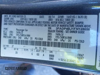 2015 Ford Fiesta SE with VIN 3FADP4BJ1FM128656, listed as a IAAI auction lot 41987997 with 106,588 mi miles. Bid and sale history available at carsss.com. Image 9.