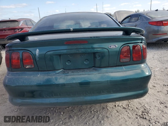 1998 Ford Mustang GT z VIN 1FAFP42X0WF255816, wystawiony jako Copart lot #55011425 z przebiegiem 144 397 mil mil oraz Czysty tytuł • Clean title. Historia ofert i sprzedaży dostępna na DreamBid. Obrazek 6.