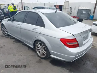 2014 Mercedes-Benz C 250 Sport with VIN WDDGF4HB8EA966999, listed as a IAAI auction lot 42452823 with 143,339 mi miles and . Bid and sale history available at DreamBid. Image 3.