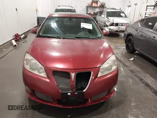 2009 Pontiac G6 GXP 1SA with VIN 1G2ZM577X94157511, listed as a IAAI auction lot 42296880 with 143,960 mi miles and . Bid and sale history available at DreamBid. Image 12.