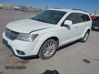 2015 Dodge Journey SXT with VIN 3C4PDCBG2FT524678, listed as a IAAI auction lot 41781070 with 118,950 mi miles and . Bid and sale history available at DreamBid. Image 2.