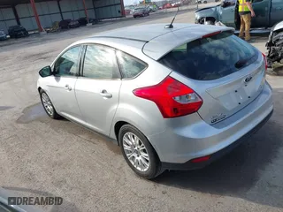 2012 Ford Focus SE with VIN 1FAHP3K27CL185977, listed as a IAAI auction lot 41674498 with 140,312 mi miles. Bid and sale history available at carsss.com. Image 3.