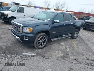 2019 GMC Canyon 4WD Denali with VIN 1GTG6EENXK1321734, listed as a IAAI auction lot 41491402 with 60,026 mi miles. Bid and sale history available at carsss.com. Image 2.