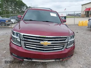 2016 Chevrolet Tahoe LT z VIN 1GNSKBKC9GR454203, wystawiony jako IAAI lot #42198952 z przebiegiem 145 422 mil mil oraz . Historia ofert i sprzedaży dostępna na DreamBid. Obrazek 12.