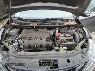 2018 Nissan Sentra S with VIN 3N1AB7AP4JY282981, listed as a Copart auction lot 52480955 with 57,217 mi miles and Salvage Title. Bid and sale history available at DreamBid. Image 11.