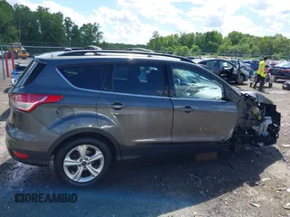 2016 Ford Escape SE z VIN 1FMCU9GX8GUA79697, wystawiony jako IAAI lot #42199779 z przebiegiem 131 826 mil mil oraz . Historia ofert i sprzedaży dostępna na DreamBid. Obrazek 14.