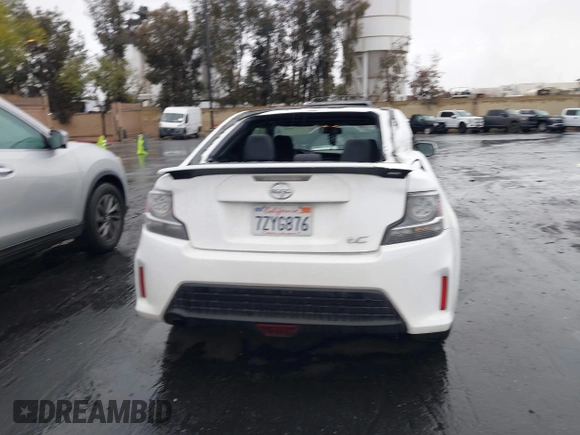 2014 Scion tC z VIN JTKJF5C77E3080128, wystawiony jako IAAI lot #42174898 z przebiegiem Nie podano mil oraz . Historia ofert i sprzedaży dostępna na DreamBid. Obrazek 16.