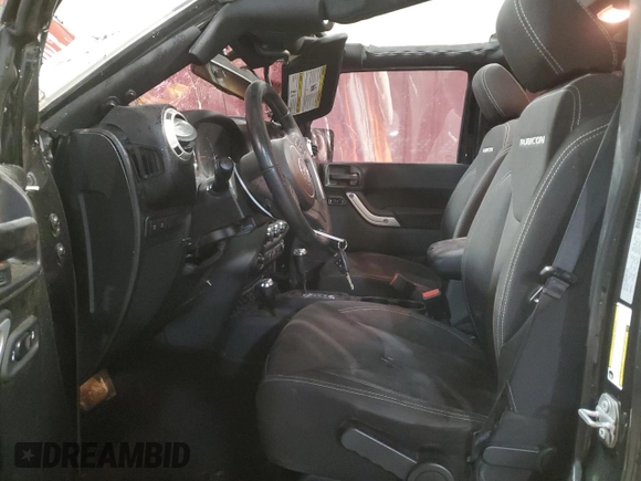 2017 Jeep Wrangler Unlimited Rubicon Recon with VIN 1C4BJWFG3HL577788, listed as a Copart auction lot 82932034 with 142,752 mi miles and Salvage title. Bid and sale history available at DreamBid. Image 7.