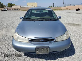2000 Ford Contour SE Fleet z VIN 1FAFP66L8YK104588, wystawiony jako Copart lot #71769314 z przebiegiem 106 163 mil mil oraz Szkody całkowita. Historia ofert i sprzedaży dostępna na DreamBid. Obrazek 5.