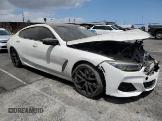 2021 BMW 8 Series M850i with VIN WBAGV8C04MCF56486, listed as a Copart auction lot 55991015 with 60,249 mi miles and Salvage title. Bid and sale history available at DreamBid. Image 4.