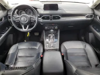 2018 Mazda CX-5 Grand Touring with VIN JM3KFADMXJ1358221, listed as a Copart auction lot 59746545 with 54,094 mi miles and Salvage title. Bid and sale history available at DreamBid. Image 8.